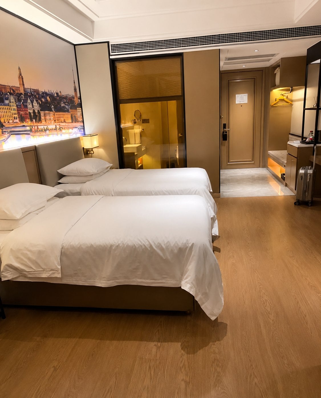Hotel guest room with concealed horizontal fan coil unit