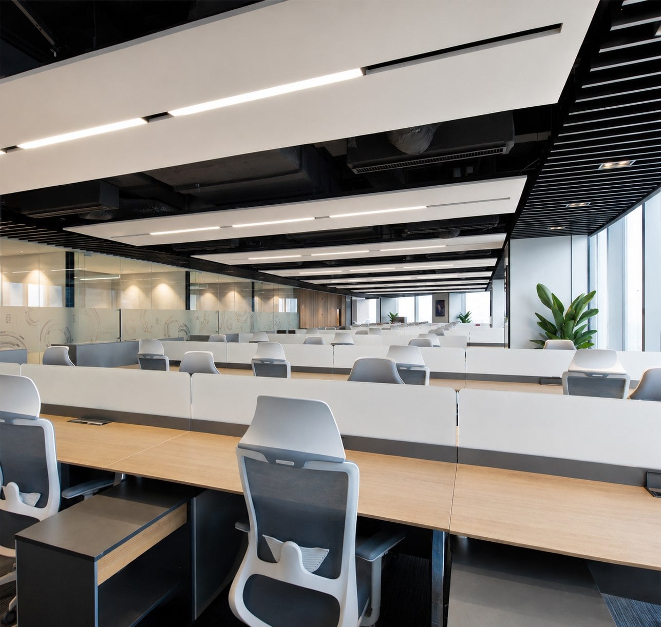 Office ceiling with concealed fan coil air outlets